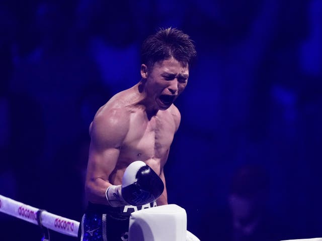<p>Naoya Inoue celebrates stopping Stephen Fulton to take his super-bantamweight belts</p>