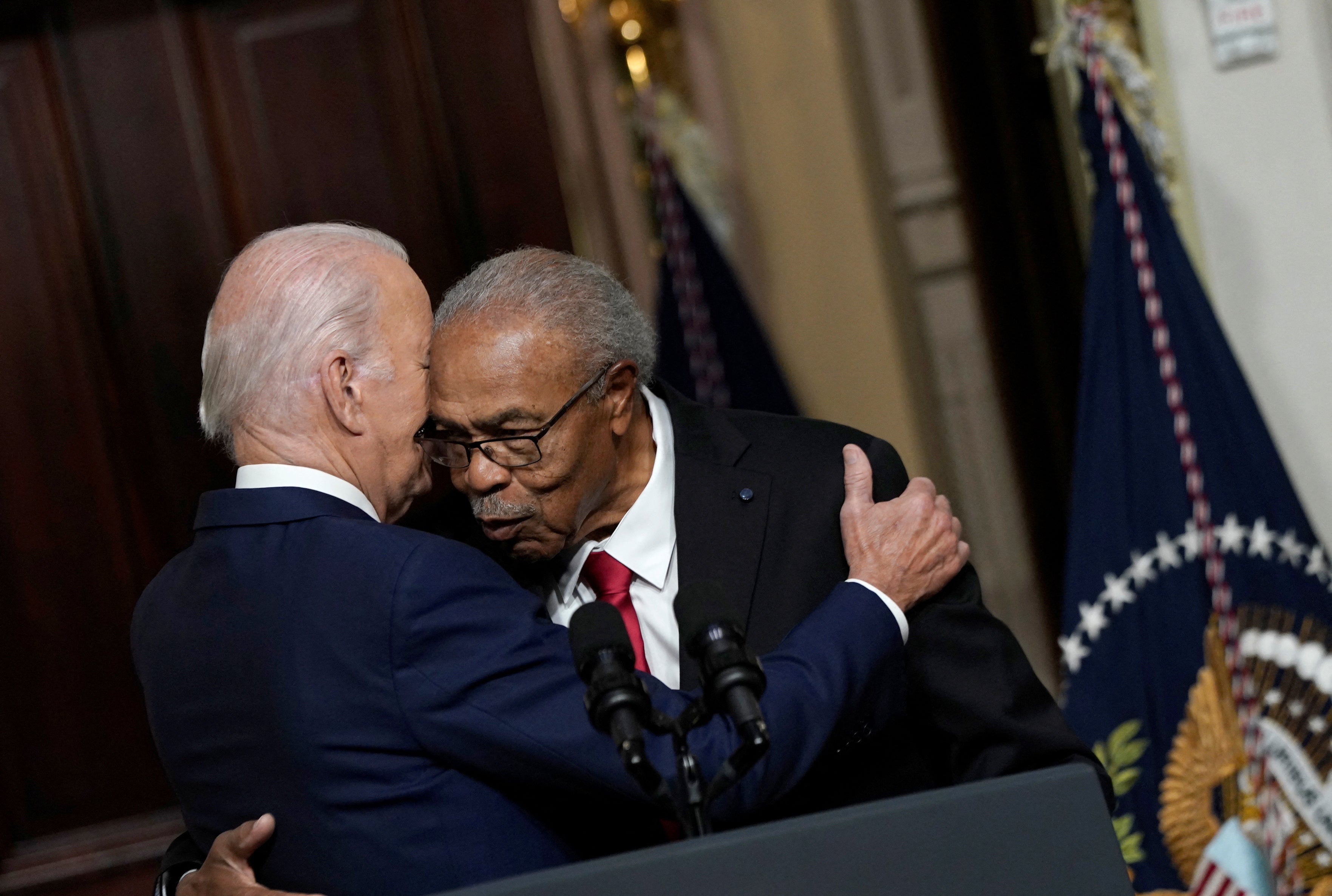 President Joe Biden embraces Rev Wheeler Parker, Emmett Till’s cousin and one of the last people to see him alive in 1955