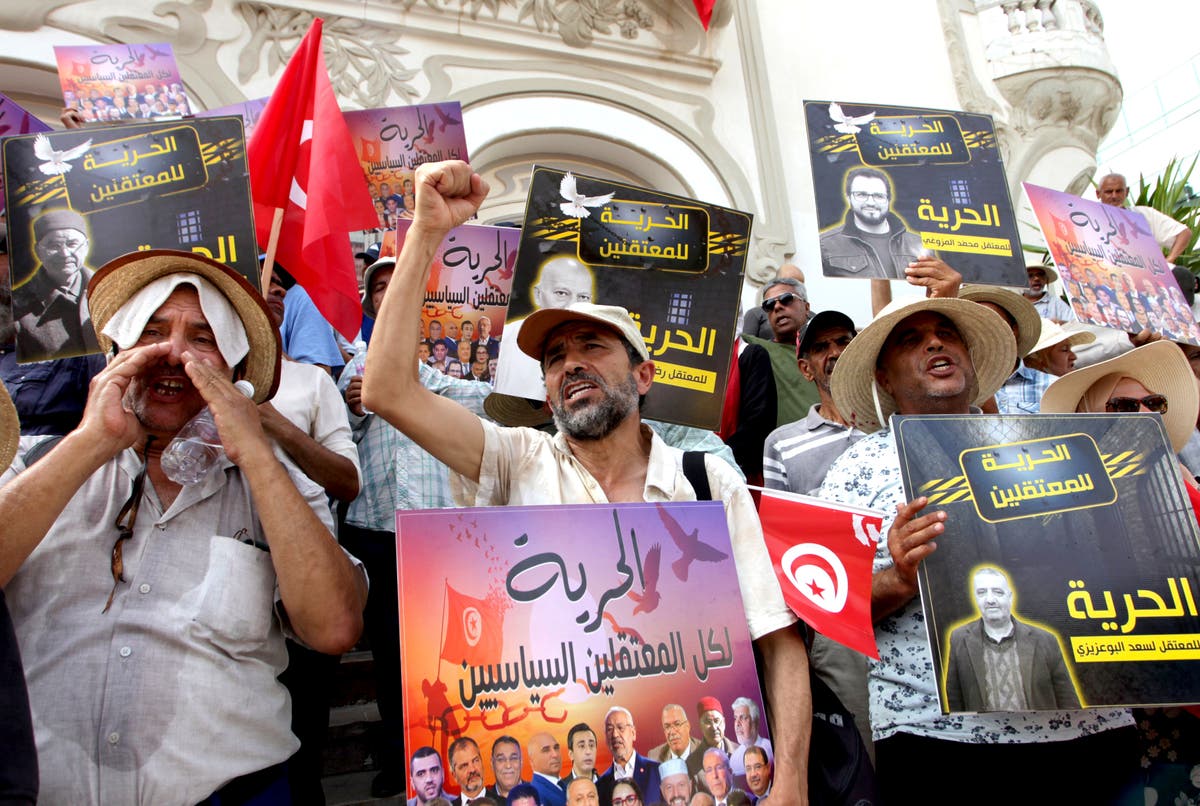 Tunisians protest president’s expanding powers and demand release of all jailed political opponents