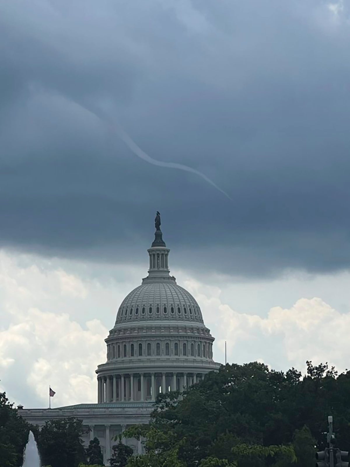 Unusual photo of funnel cloud over US Capitol goes viral