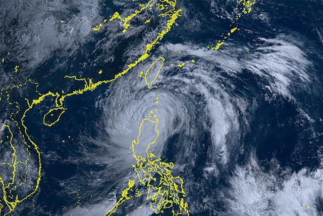 <p>This satellite image taken by Himawari-8, a Japanese weather satellite, and provided by National Institute of Information and Communications Technology, shows Typhoon Doksuri in the middle </p>