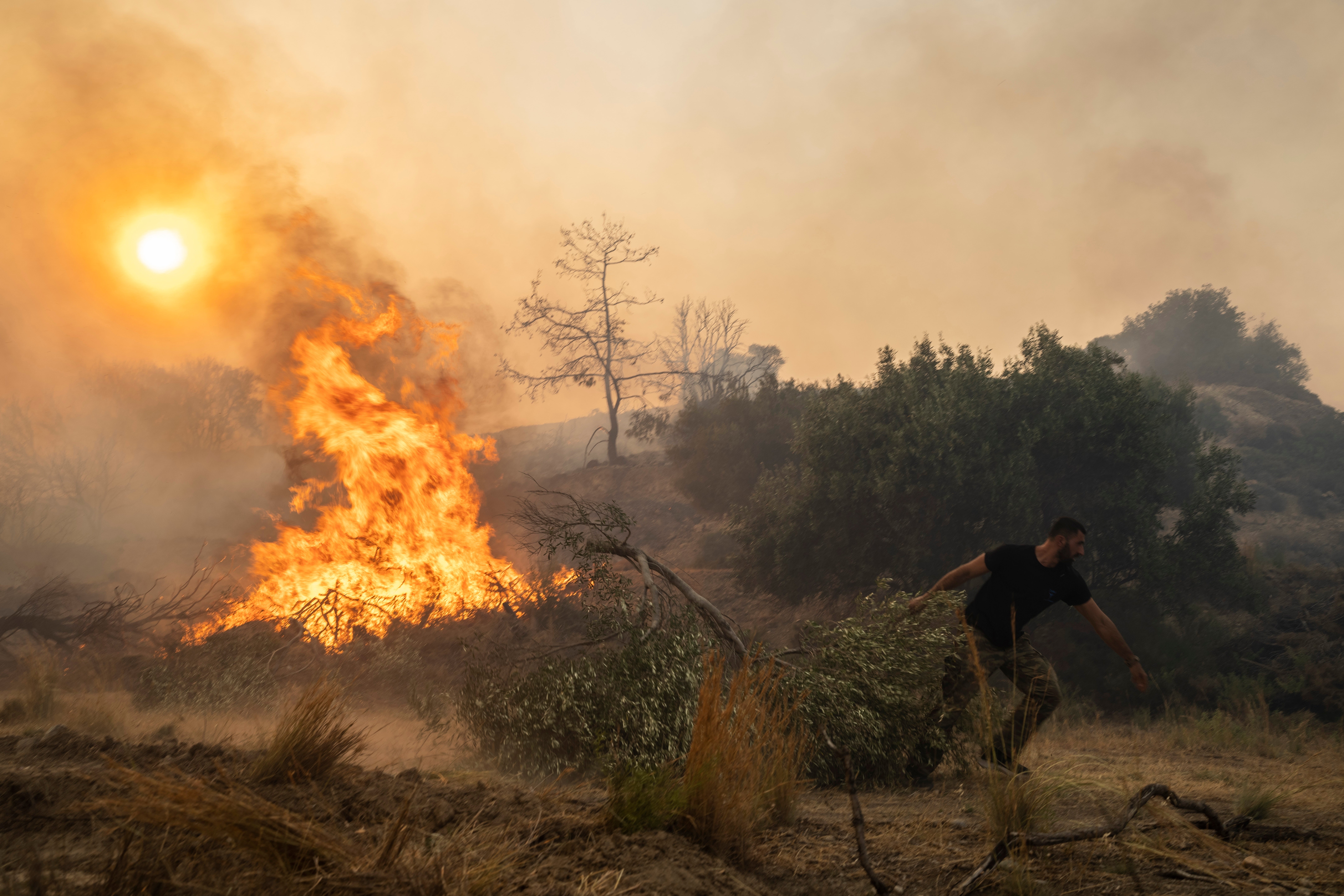 Wildfires are ravaging Rhodes, pictures, as well as Corfu, Evia, and the Peloponnese region