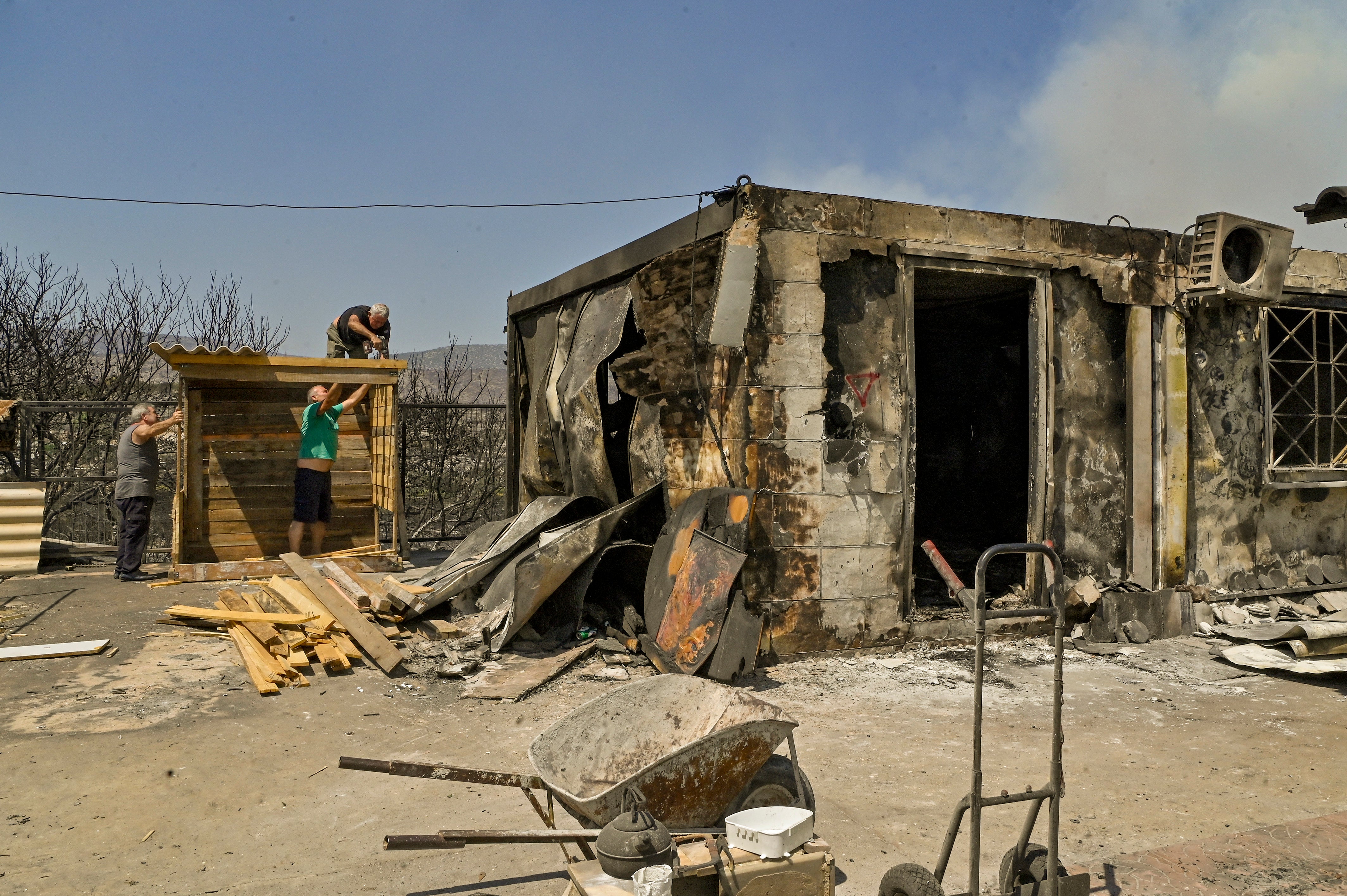 A destroyed house after wildfire in Mandra near Athens