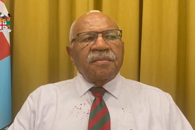 <p>Fiji’s prime minister, Sitiveni Rabuka, appears in video with blood-stained clothes and bandage on head to announce cancellation of China trip </p>