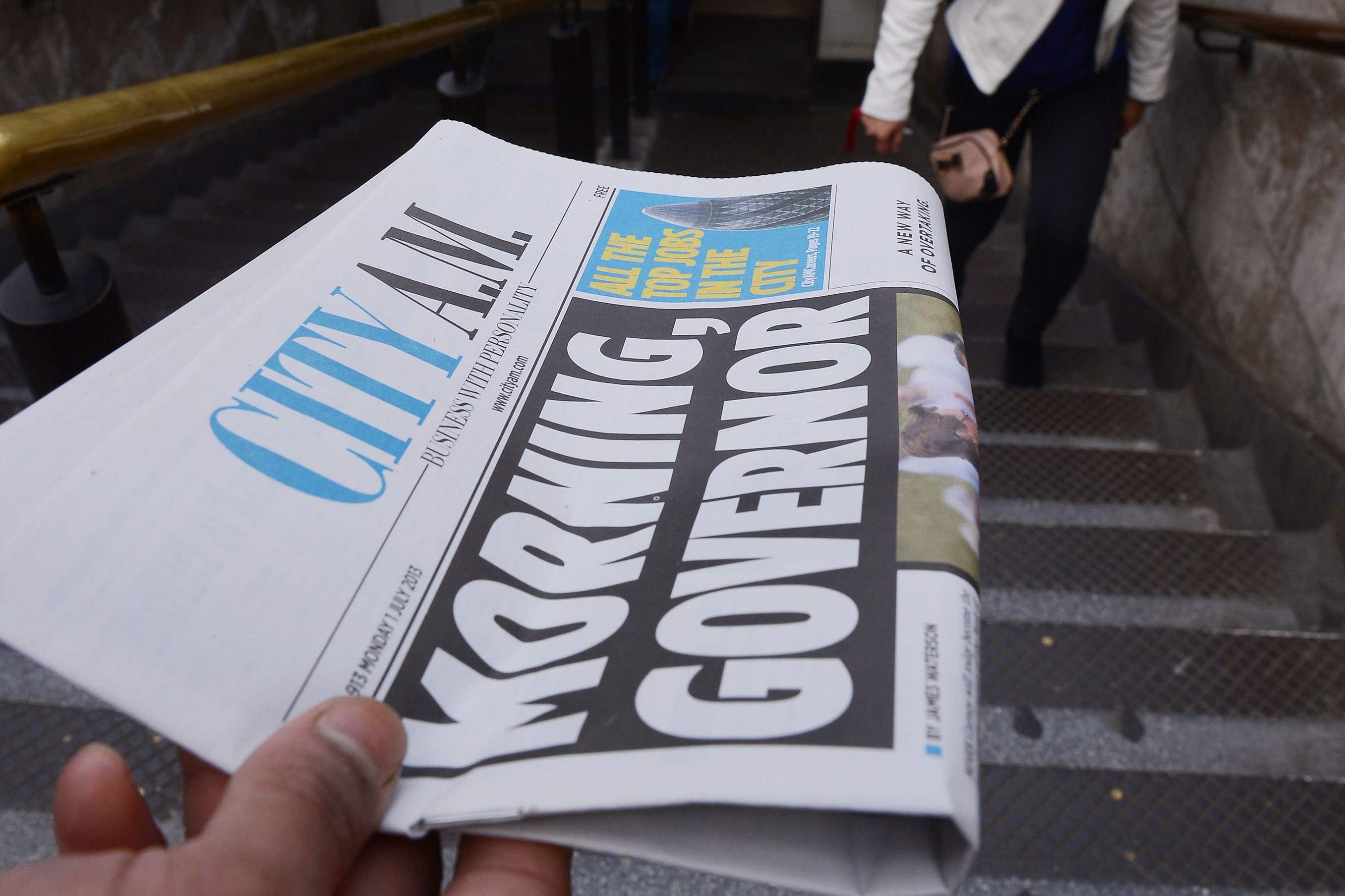 City AM is handed out at Bank Station in London (Stefan Rousseau/PA)