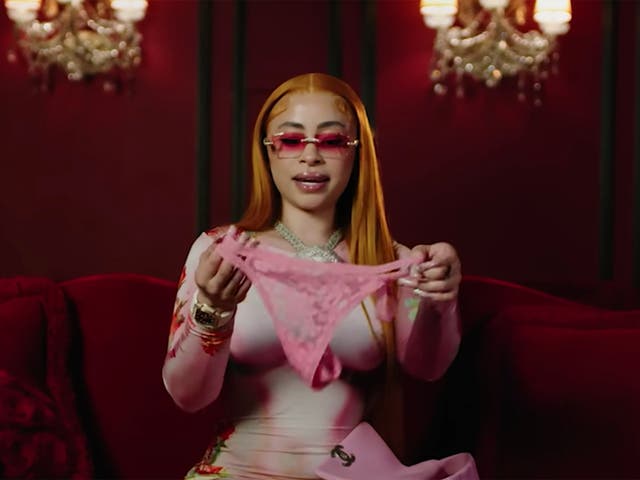 <p>Ice Spice pulls a spare pair of pink underwear out of her handbag in a video for ‘Vogue’ </p>