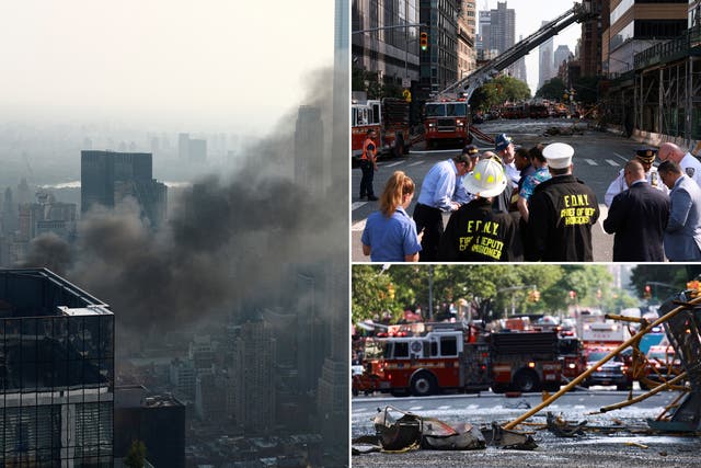 <p>Members of the Fire Department of the City of New York (FDNY) and others gather  after a crane collapsed at a highrise construction site in Hell’s Kitchen </p>