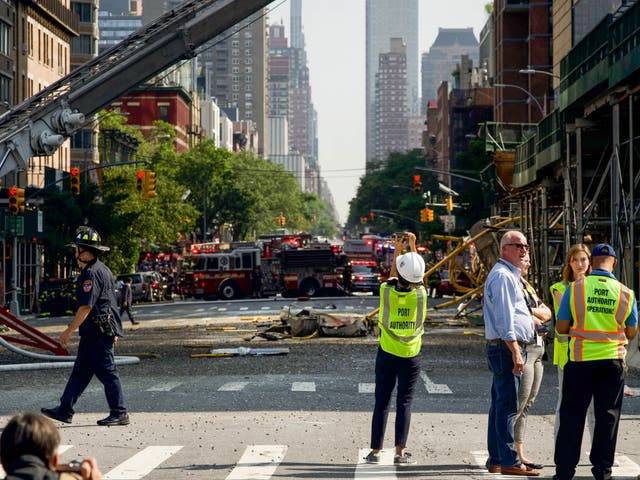 <p>Debris from the construction crane that collapsed in Manhattan, New York lies on the street on 26 June </p>