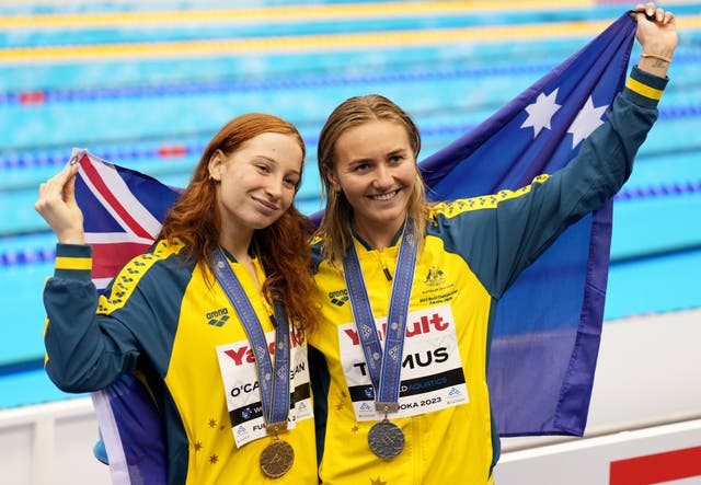 <p>Mollie O’Callaghan and Ariarne Titmus of Australia celebrate with their medals at the World Aquatics Championship</p>
