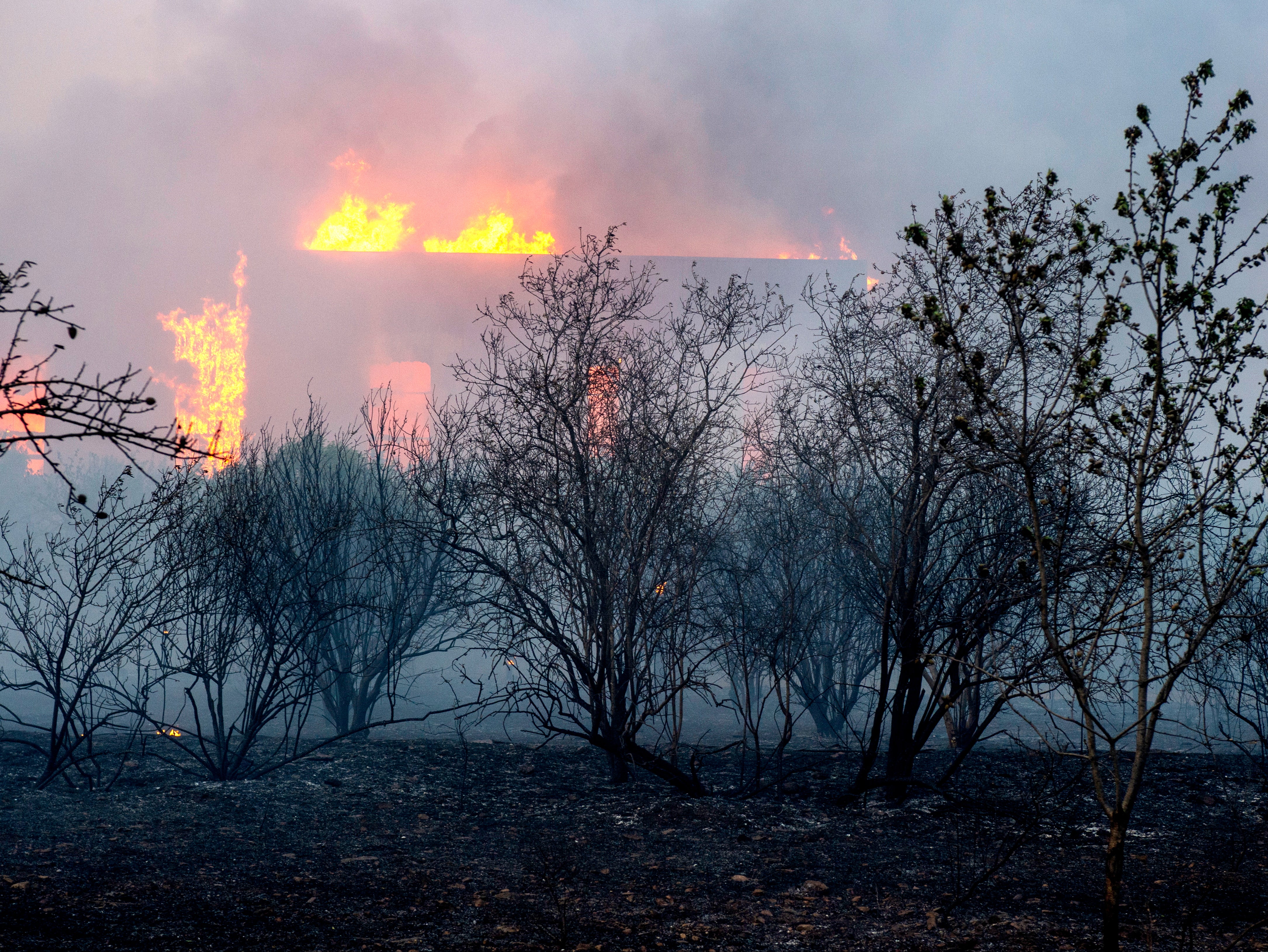 A house on fire at Sesklo village, in Volos, eastern central Greece