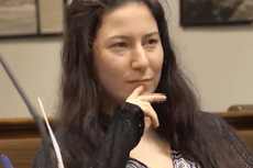 Accused murderer smirks as court hears how her lover’s head was discovered in bucket