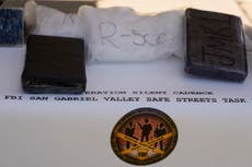 Charges filed against members of Southern California gang after killing of 2 police officers