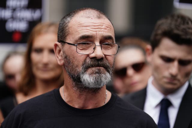 Andrew Malkinson, who served 17 years in prison for a rape he did not commit, reads a statement outside the Royal Courts of Justice in London, after being cleared by the Court of Appeal (Jordan Pettitt/PA)