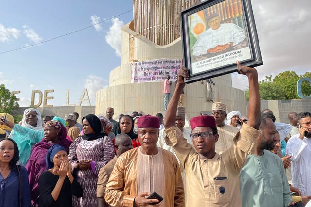 <p>Supporters of Niger president Mohamed Bazoum gather to show their support for him in Niamey on 26 July 2023</p>