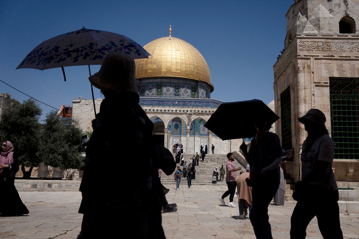 Army fire kills a 14-year-old, Palestinians say, as an Israeli minister visits flashpoint mosque