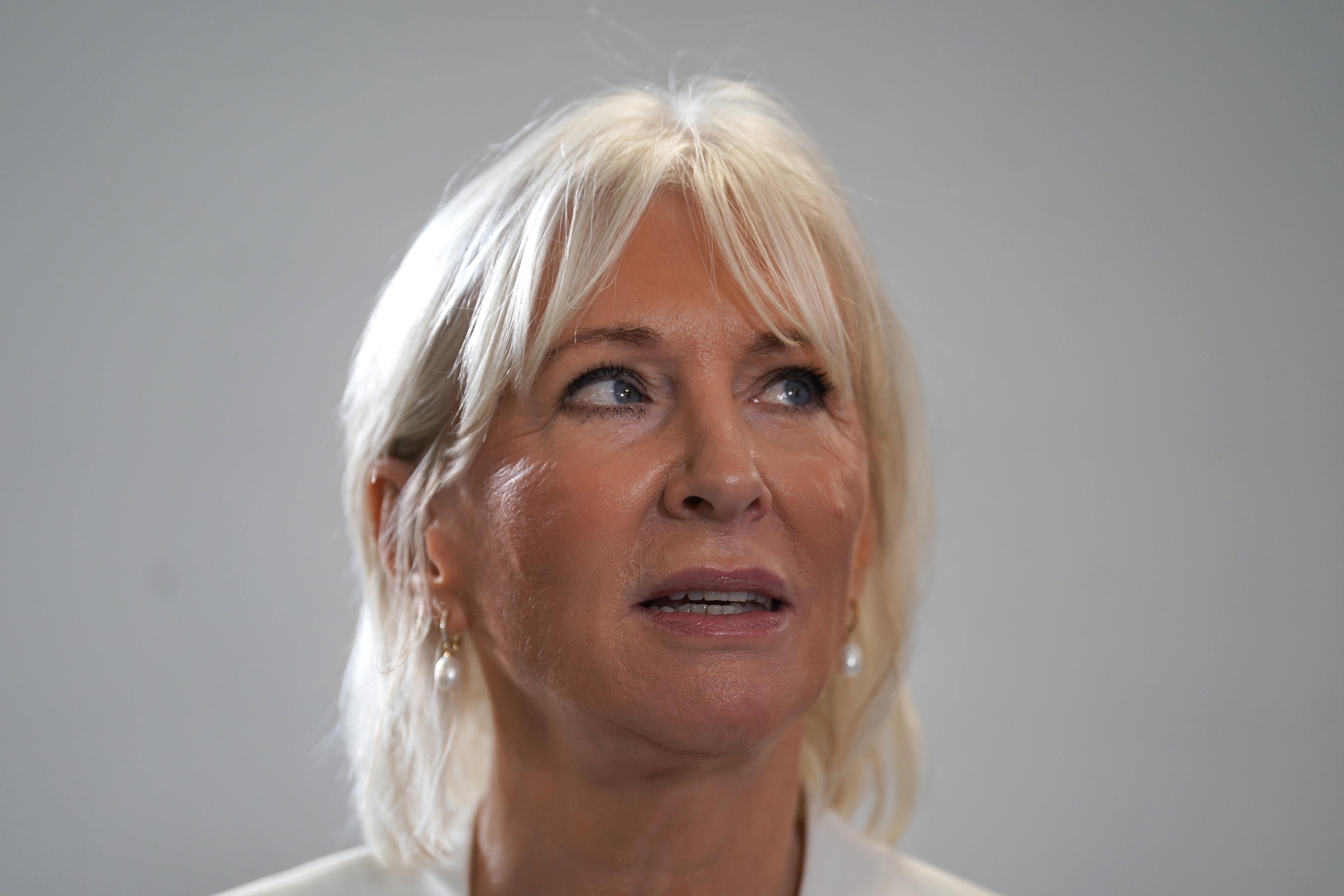 Nadine Dorries has been urged to vacate her seat by a town council n her constituency (Kirsty O’Connor/PA)