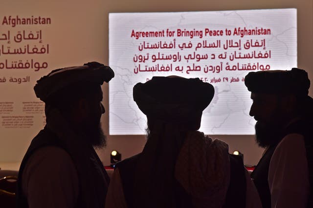 <p>File: Members of the Taliban delegation gather ahead of the signing ceremony with the United States in the Qatari capital Doha in 2020 </p>
