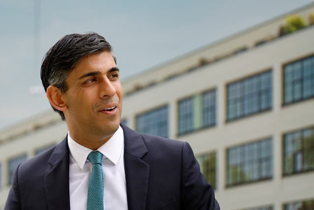 Prime Minister Rishi Sunak during a visit to Hayes Village, a new housing development under construction by Barratt Homes in Hayes, west London (Pete Cziborra/PA)