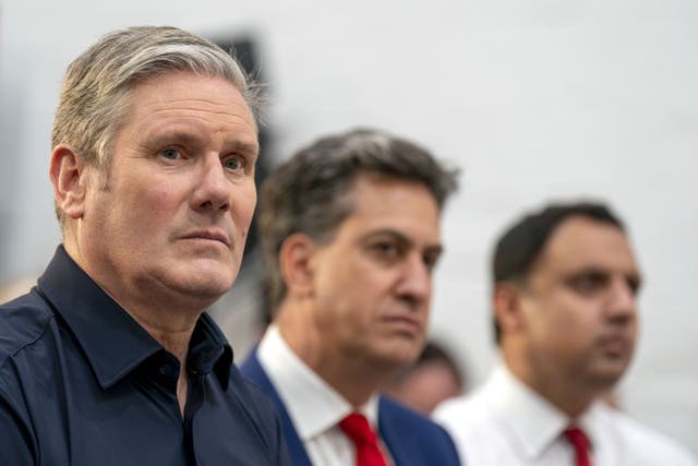 Labour leader Sir Keir Starmer, shadow climate change secretary Ed Miliband and Scottish Labour leader Anas Sarwar at the launch of the Labour party’s mission on cheaper green power last month (Jane Barlow/PA)