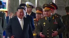 Russian defence minister meets Kim Jong-un during visit to arms exhibition in North Korea