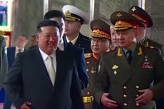Russian defence minister meets Kim Jong-un during visit to arms exhibition in North Korea