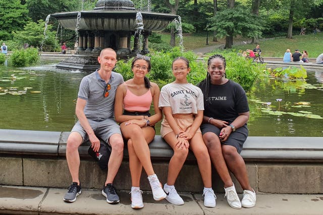 Colin Spicer (far left) with his wife and children, who intended on holidaying in Rhodes in late August. (Colin Spicer/PA)