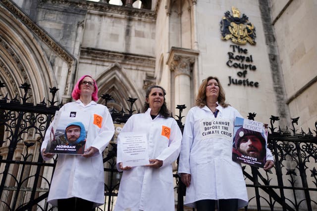 <p>Just Stop Oil protesters outside the Royal Courts of Justice in London, where activists Morgan Trowland and Marcus Decker are appealing their jail sentences</p>