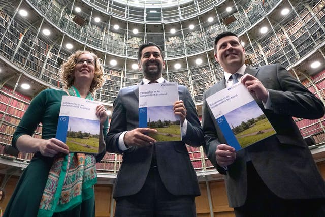 First Minister Humza Yousaf alongside Jamie Hepburn, Minister for Independence, and Lorna Slater, Minister for Green Skills (Andrew Milligan/PA)