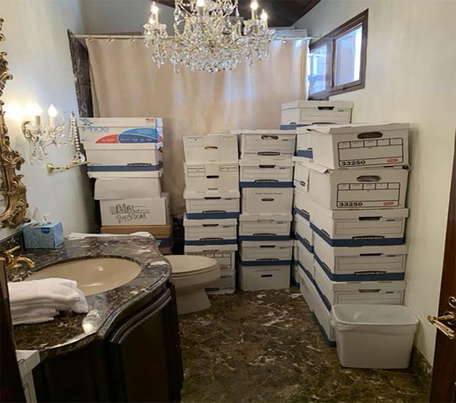 <p>In this handout photo provided by the US Department of Justice, stacks of boxes can be observed in a bathroom and shower in The Mar-a-Lago Club’s Lake Room at former US President Donald Trump’s Mar-a-Lago estate in Palm Beach, Florida</p>