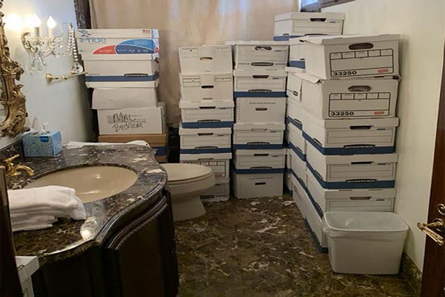 <p>In this handout photo provided by the US Department of Justice, stacks of boxes can be observed in a bathroom and shower in The Mar-a-Lago Club’s Lake Room at former US President Donald Trump’s Mar-a-Lago estate in Palm Beach, Florida</p>