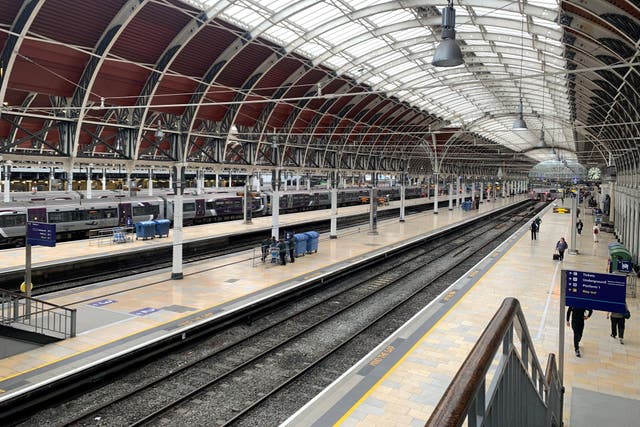 Members of the Rail, Maritime and Transport union, including station staff and train managers, will walk out, causing disruption to services (PA)