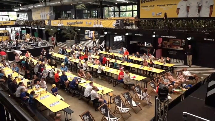 <p>England fans celebrate at Boxpark as Lionesses score against Denmark in World Cup</p>