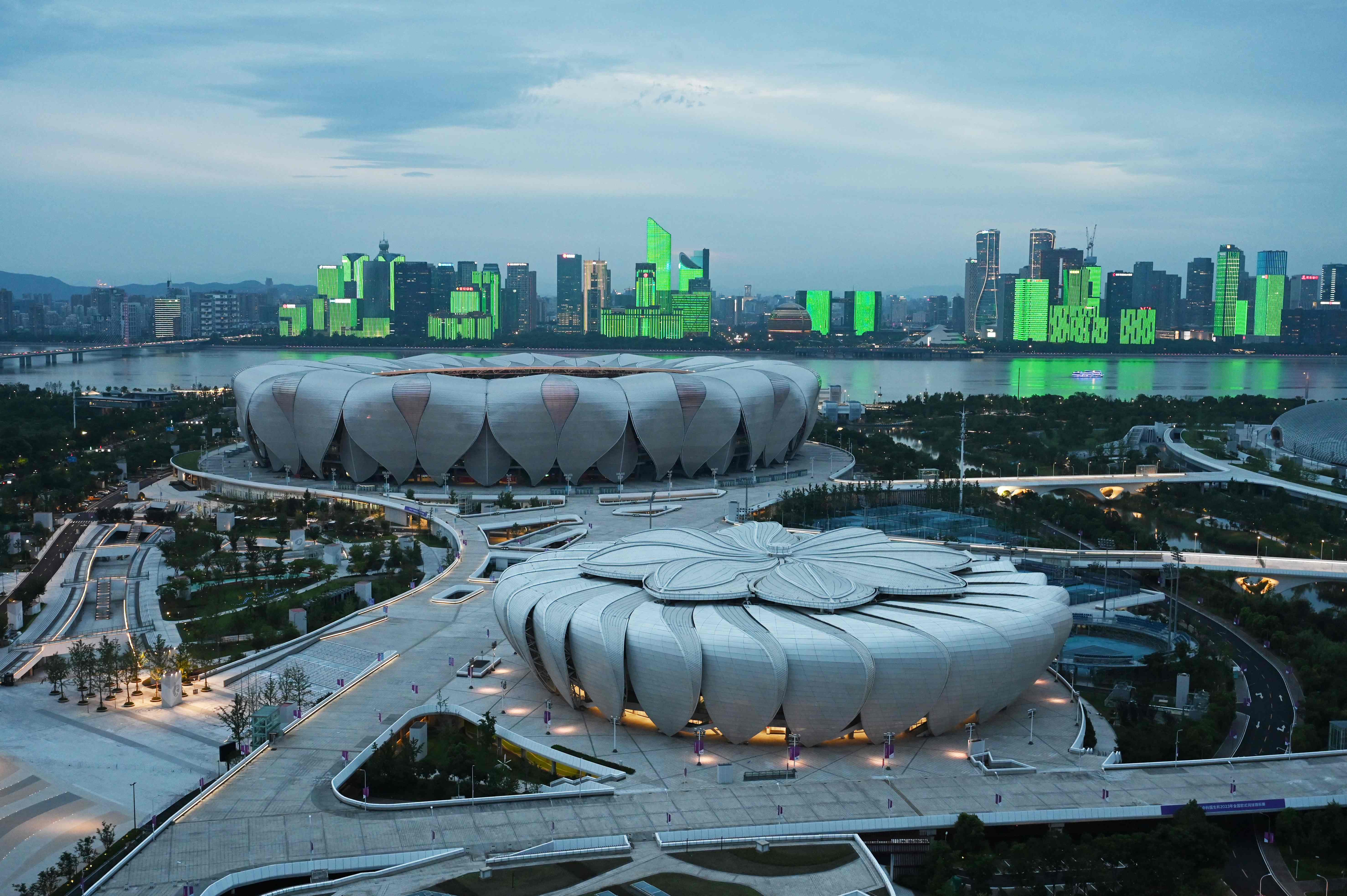 Hangzhou Olympic Sports Center Stadium (back) and Tennis Centre (front) which will host competition at the Asian Games in Hangzhou