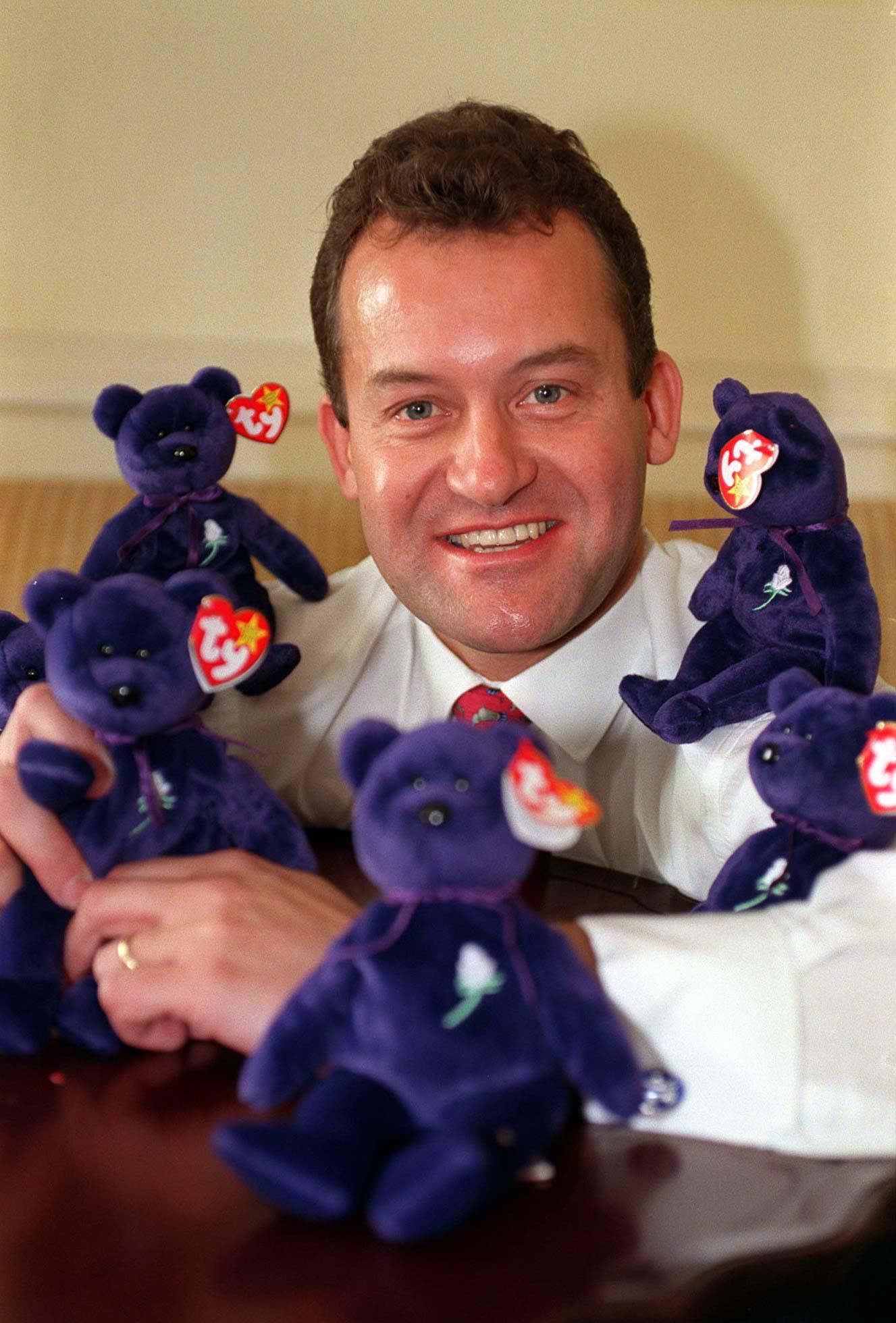 Diana’s butler and ‘rock’ Paul Burrell poses with the Diana Beanie Baby in 1998