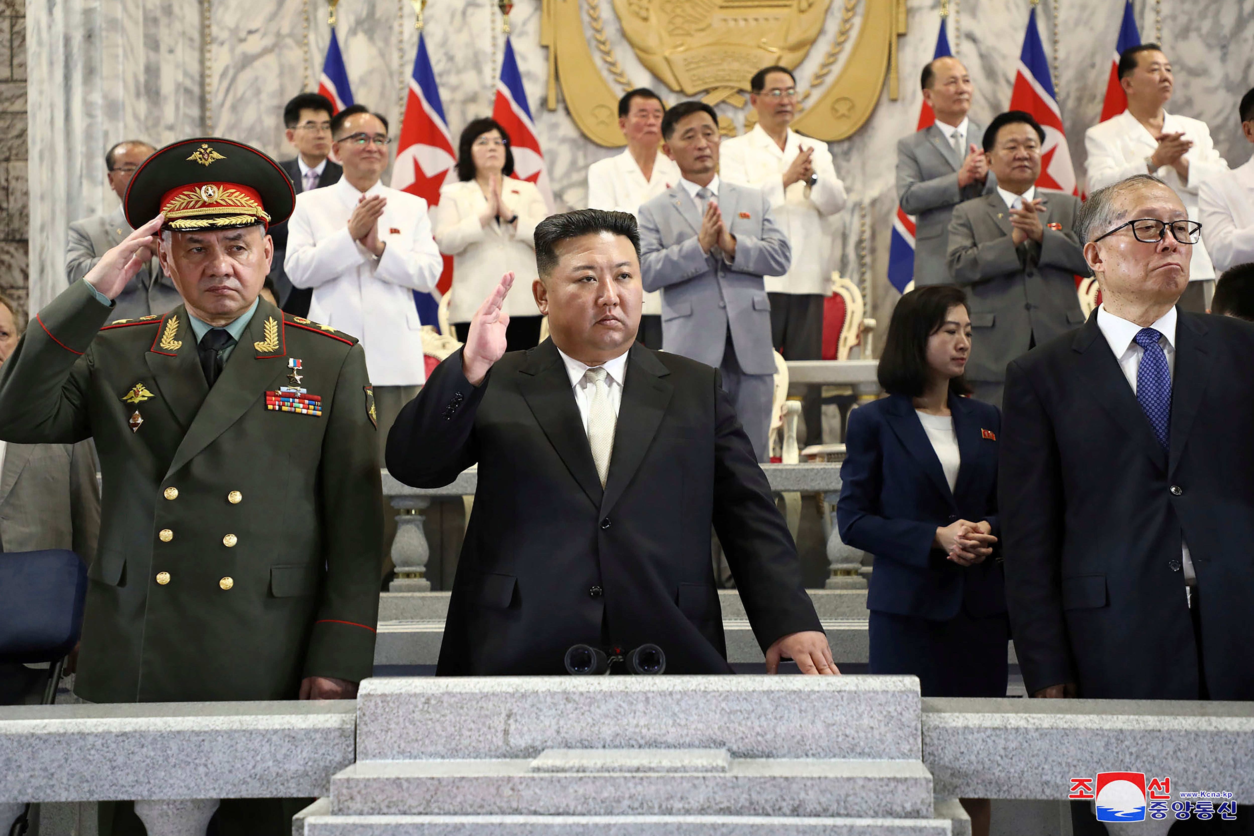 North Korean leader Kim Jong-un, center, Russian defence minister Sergei Shoigu, left, and China’s Vice Chairman of the standing committee of the country’s National People’s Congress Li Hongzhong, right, attend a military parade to mark the 70th anniversary of the armistice that halted fighting in the 1950-53 Korean War, on Kim Il Sung Square in Pyongyang