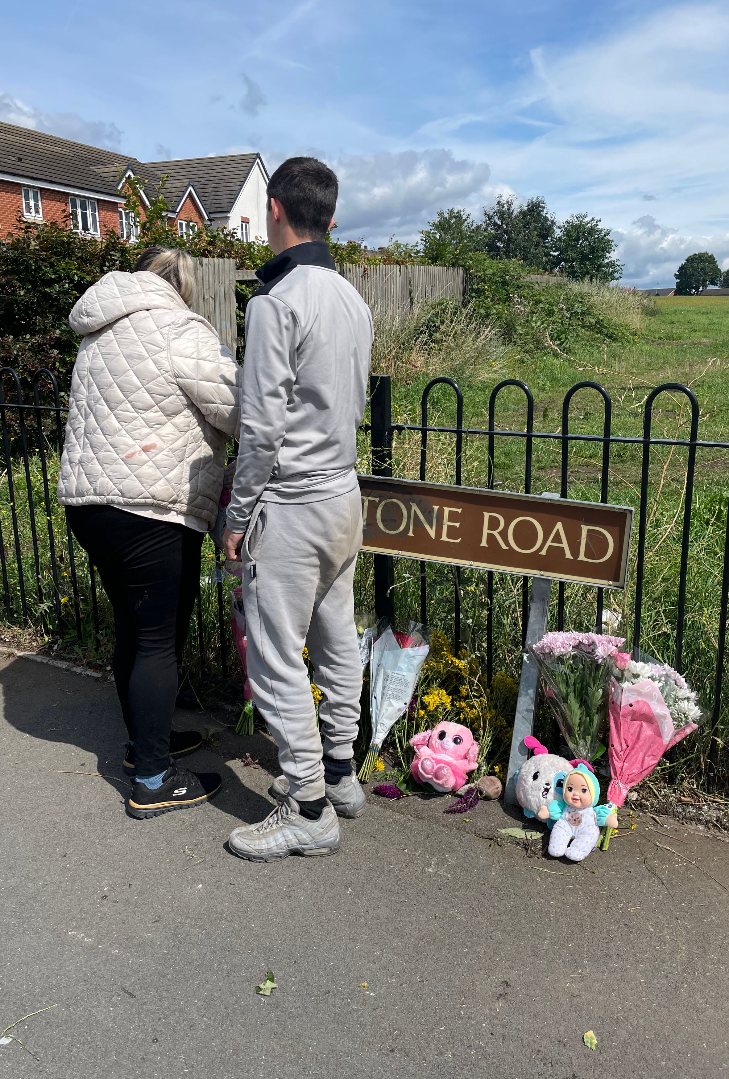 A stream of emotional locals have been visiting the scene to add their own tributes