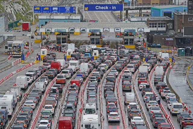 <p>Cars queue at the Port of Dover, Kent, as the busy summer travel period continues on Saturday</p>