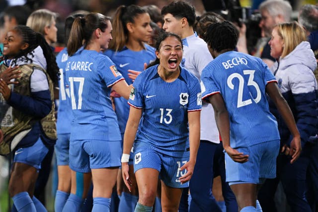 <p>Selma Bacha and Vicki Becho of France celebrate beating Brazil </p>
