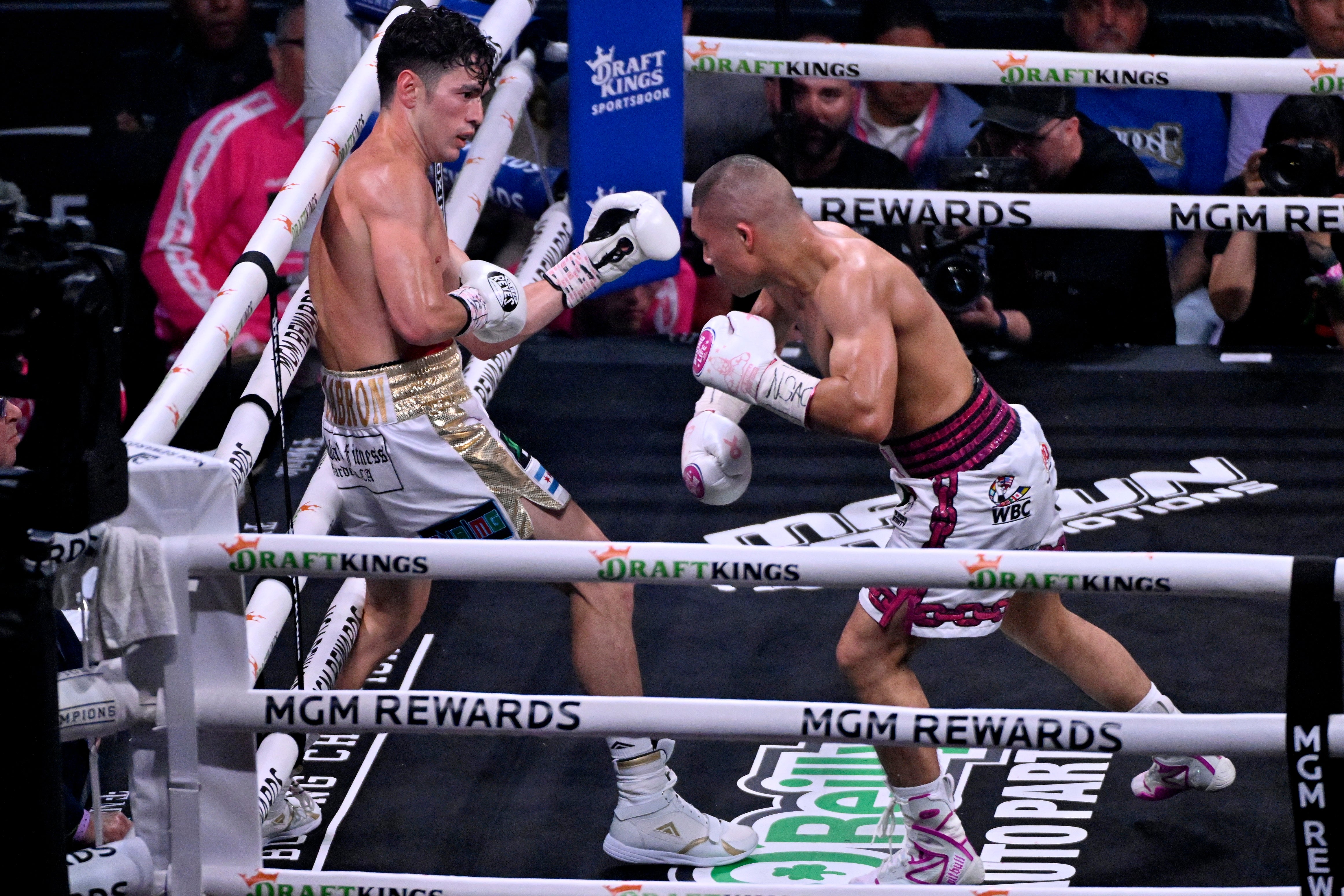 Cruz pins Cabrera against the ropes