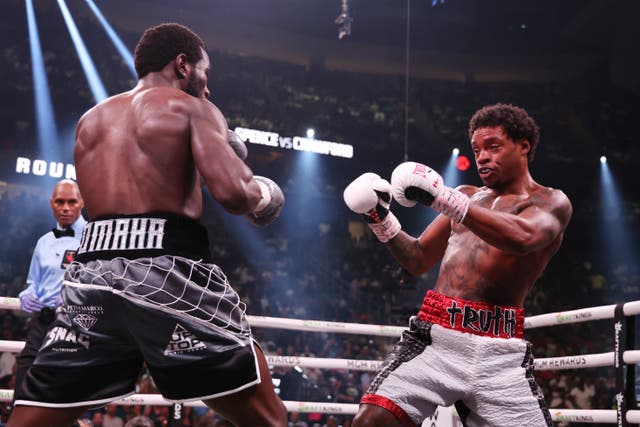 <p>Errol Spence Jr, right, is rocked by a punch from Terence Crawford</p>