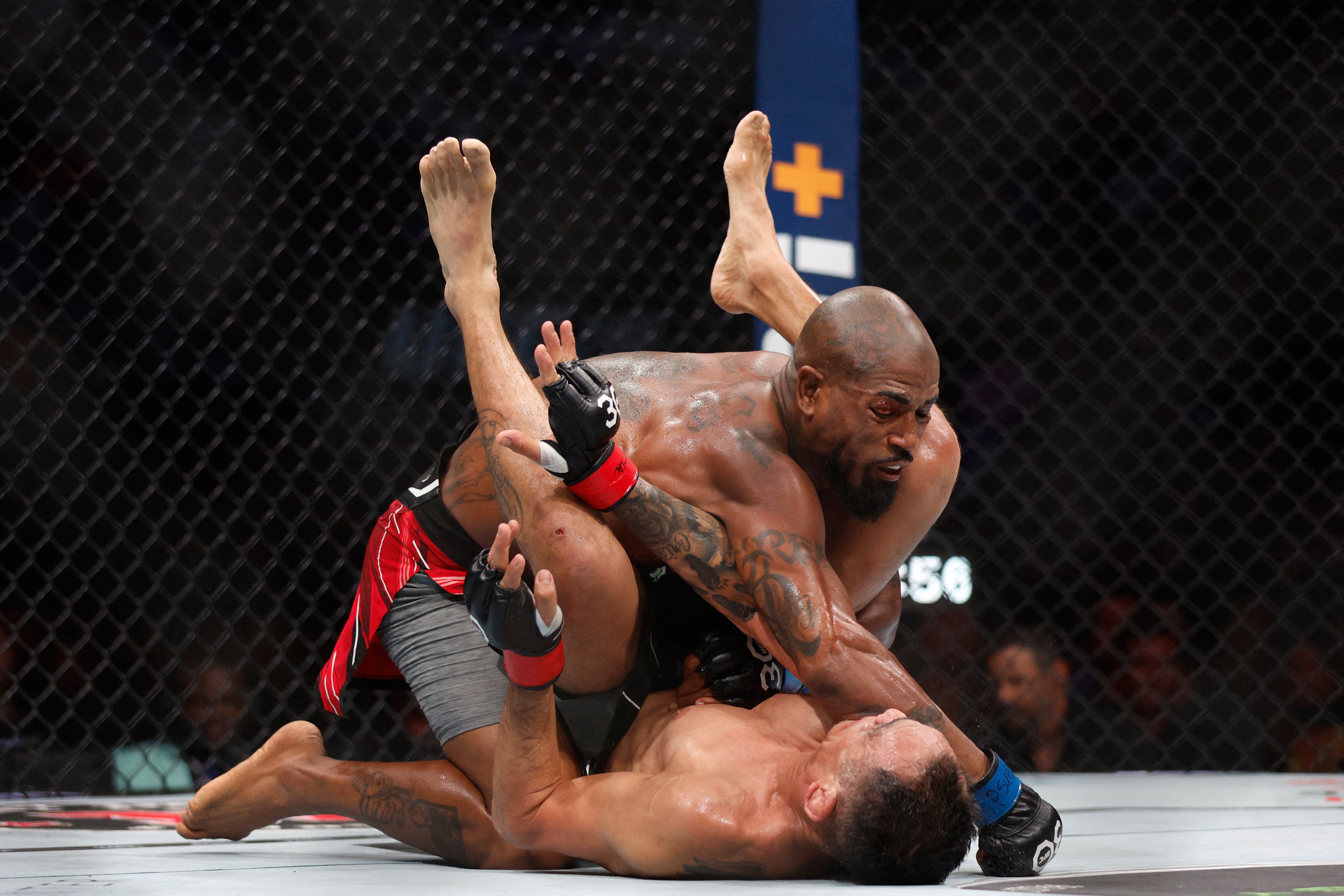 Bobby Green, top, got the better of Tony Ferguson before submitting him in the final seconds