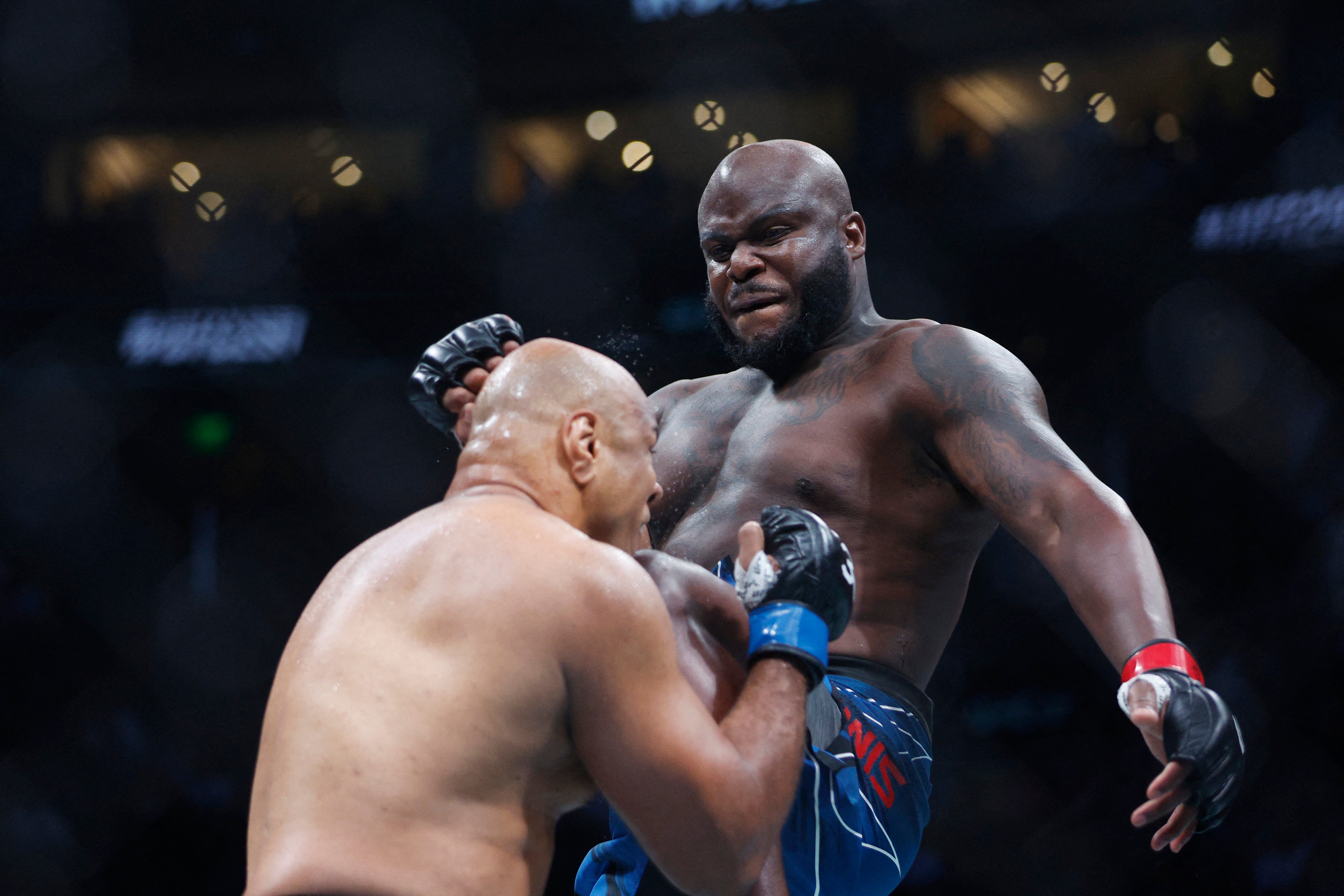 Derrick Lewis drops Marcos Rogerio de Lima with a flying knee before securing an early TKO
