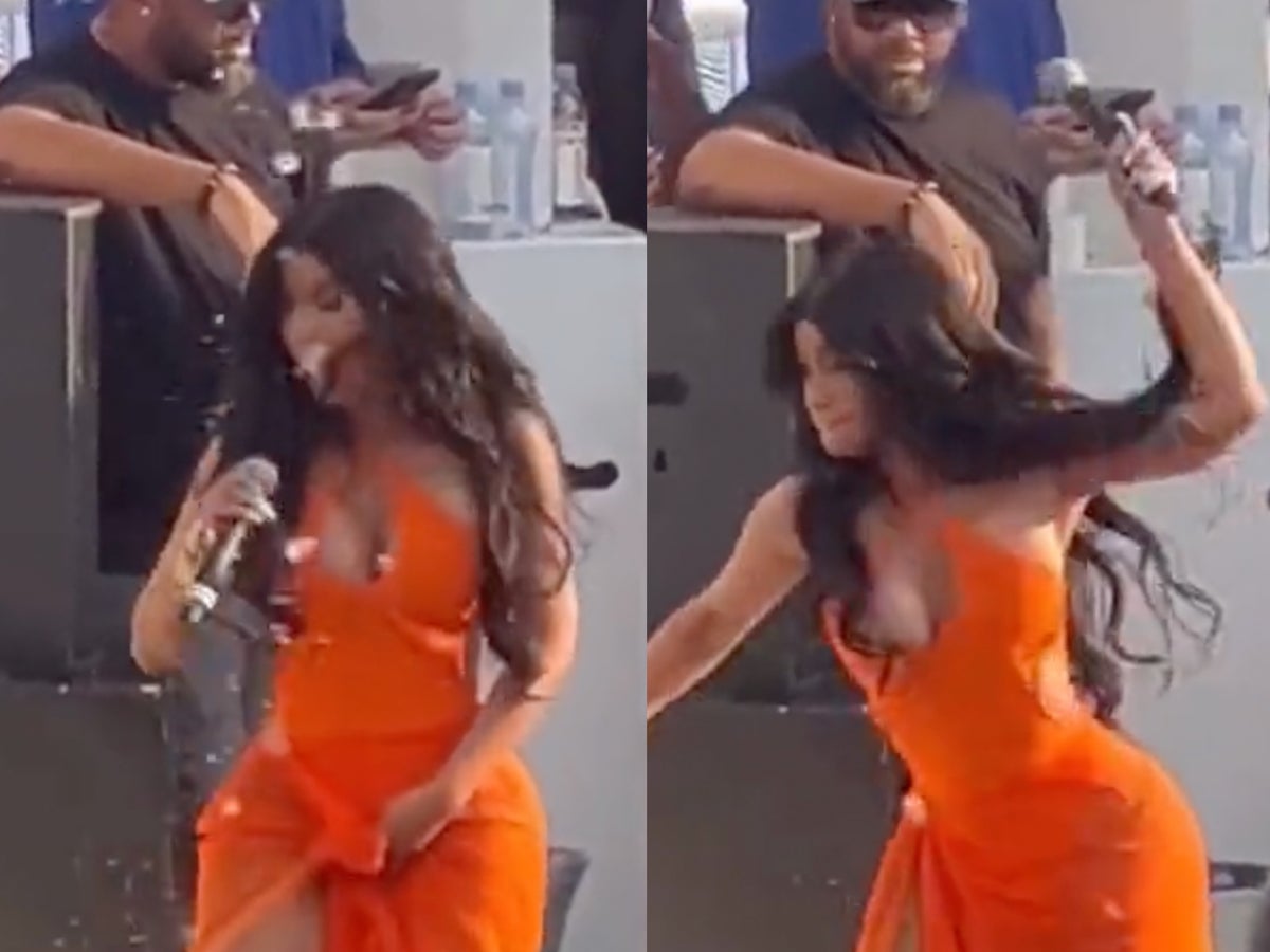Cardi B hurls microphone at concertgoer who tosses drink at her onstage