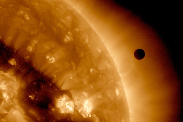 <p>In this handout image provided by NASA, the SDO satellite captures a ultra-high definition image of the Transit of Venus across the face of the sun at on June 6, 2012 from space</p>