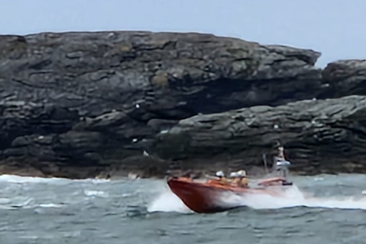 Huge sea search for fisherman &lsquo;swept from rocks&rsquo; in north Wales called off