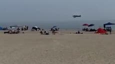 Moment plane crashes onto busy New Hampshire beach with no injuries reported