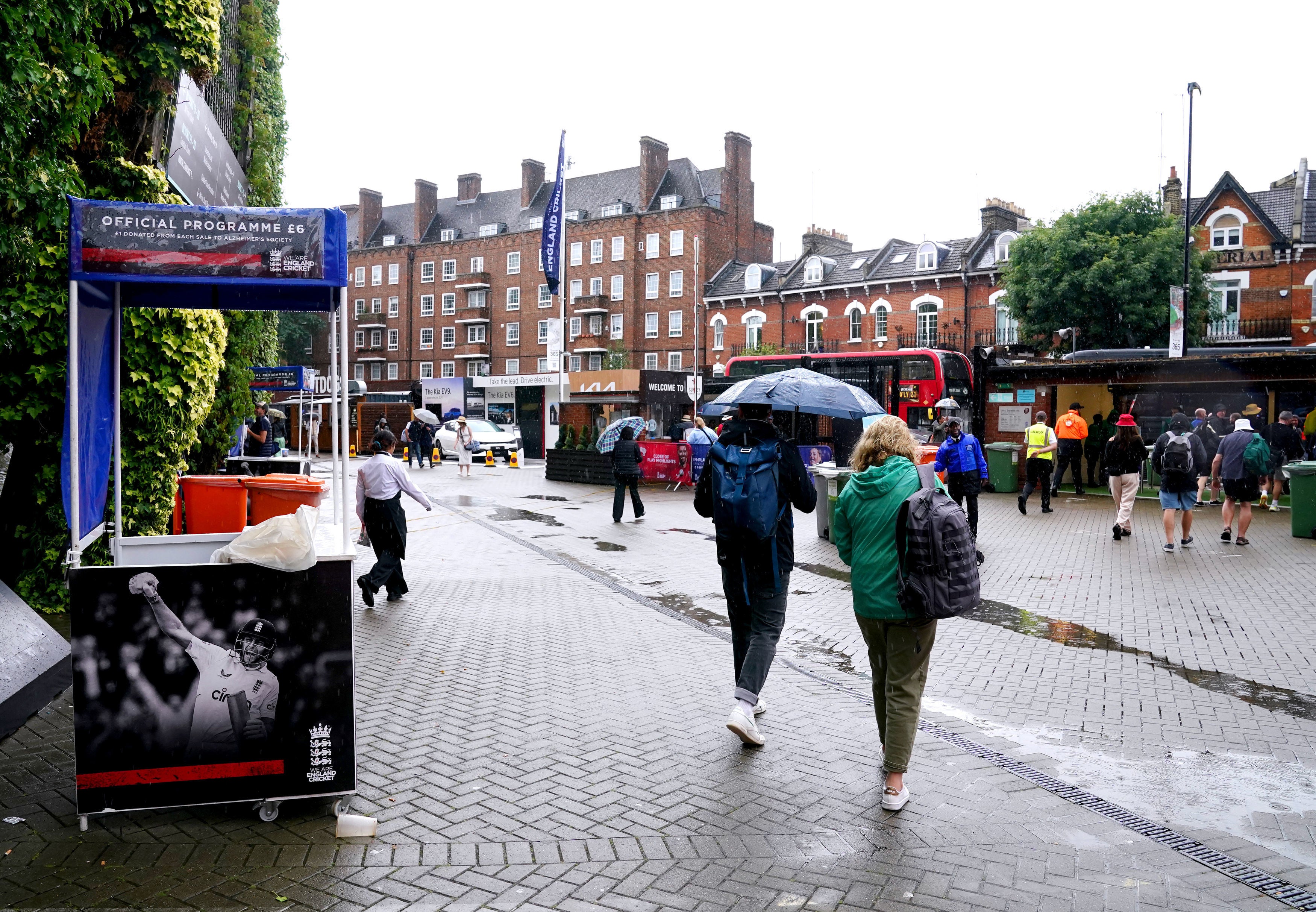 <p>Fans leave as play is abandoned due to rain on day four of the fifth LV= Insurance Ashes Series test match at The Kia Oval, London</p>