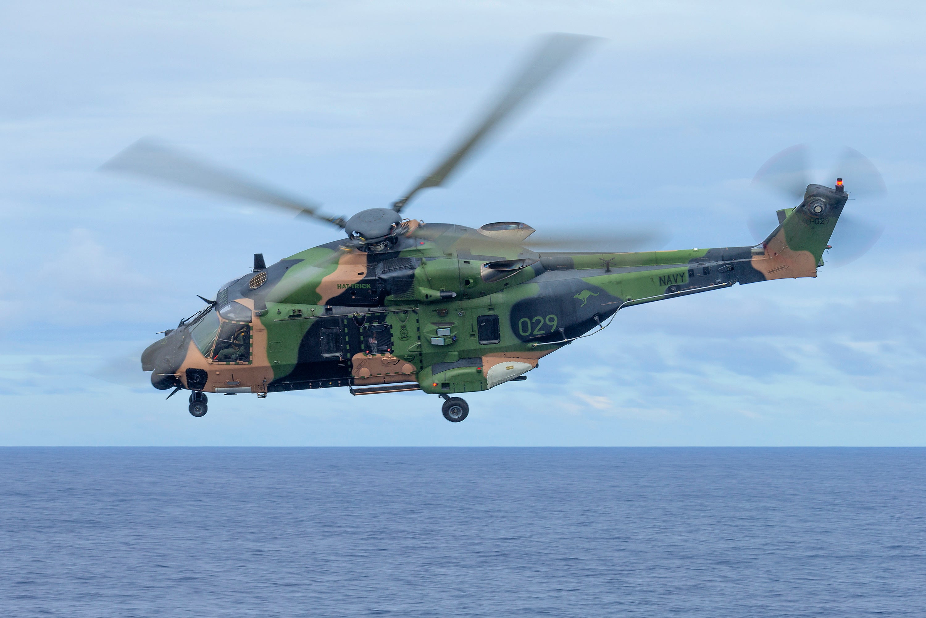 An Australian Army MRH-90 Taipan helicopter conducting flying serials