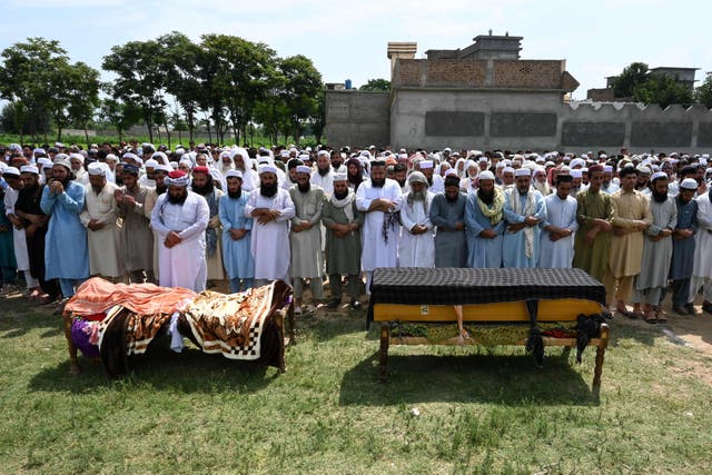 <p>People offer funeral prayers to the victims who died in a bomb blast in Bajaur district of Khyber-Pakhtunkhwa province </p>