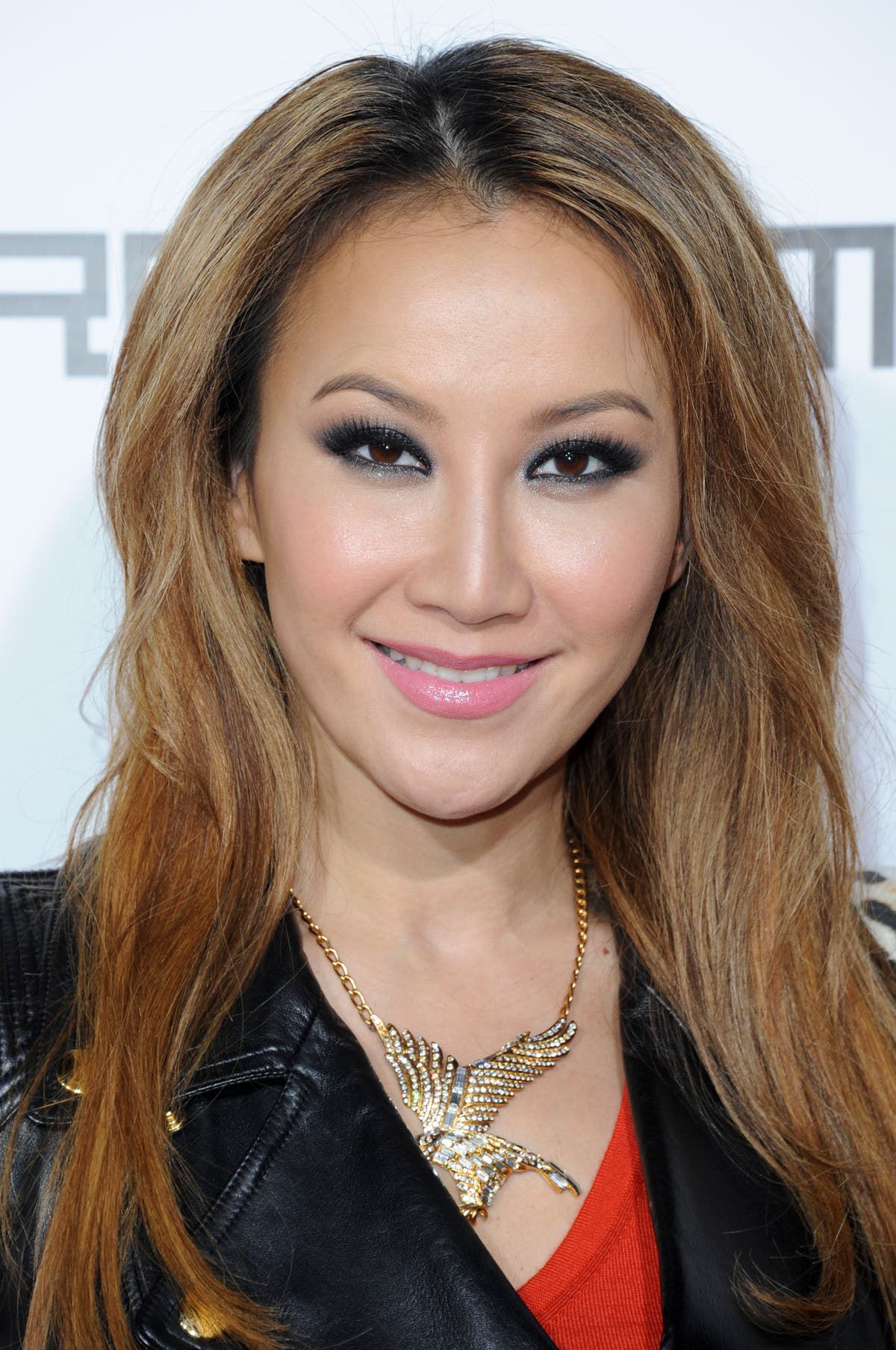 Live: Fans gather inside funeral hall to mourn singer-songwriter Coco Lee